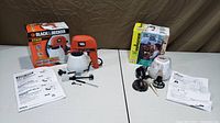 Full lot showing Black & Decker sprayer with accessories and Wagner box with parts