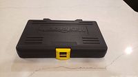 Closed Mastercraft plastic case with yellow latch