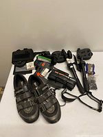 Entire lot showing shoes, aerobars, tire, pumps, tools and accessories