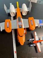 Top view of both planes with ruler showing size