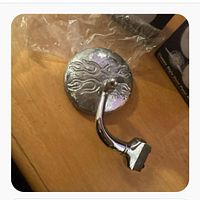 Rear view of one mirror showing flame engraving and mounting arm