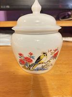 Front view of ginger jar showing bird and floral transfer print