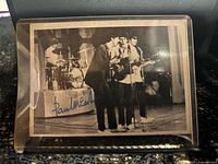 Front of Beatles trading card with Paul McCartney signature in blue ink