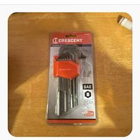 Front of sealed Crescent SAE hex key set showing red holder and keys