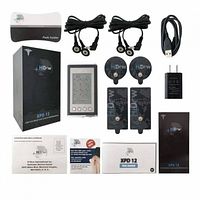 All components laid out: control unit, pads, cables, charger, manuals, spare pad pack