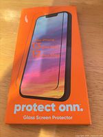 Front of retail box showing protect onn glass screen protector for iPhone 13 Pro Max/12 Pro Max