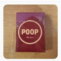 Front of sealed Poop: The Game box