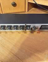 Front panel showing multiple headphone output sections with controls