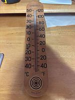 Full view of Springfield wall thermometer showing entire scale and body