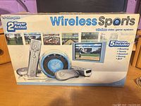 Front of Wireless Sports retail box displaying product images and features
