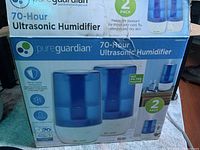 Retail box showing branding, 70-Hour Ultrasonic Humidifier, 2-pack label