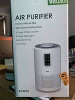 Retail box front showing brand, model and feature list