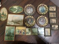 Group shot of all artwork pieces laid out on floor