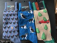 Three pairs of Hot Sox men’s graphic crew socks