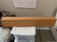 Boxed Schluter Kerdi shower curb full length