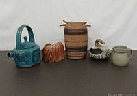 Group shot showing all five ceramic pieces