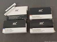 Group shot of six Montblanc refill boxes