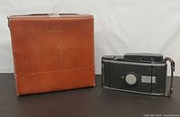 Polaroid Land Camera 150 with leather case front view