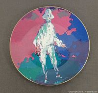 Front of Royal Doulton Pierrot plate showing artwork and gold rim