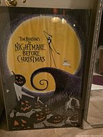 Framed poster close up showing artwork and frame