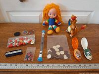 Wide shot showing all items laid out with ruler for scale