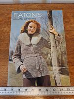 Front cover showing title 'Eaton's Fall and Winter 1975' with model