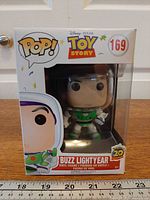 Front view of boxed Funko Pop Buzz Lightyear #169