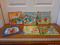 All six Berenstain Bears books front covers visible with ruler for scale
