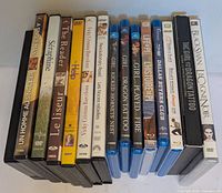 All 15 movie cases lined upright showing spines and formats