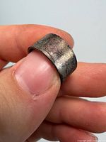 Ring side view showing band width and tarnish