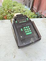 Front angled view showing Victor adding machine, keys, lever and paper roll