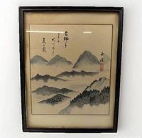 Front view of framed Chinese landscape painting