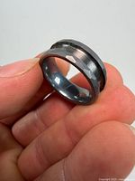 Oblique view showing faceted outer surface and polished channel