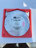 Front view of Craftsman Kromedge 7" dado set in red case