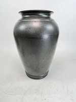 Front view of entire vase showing shape and surface texture