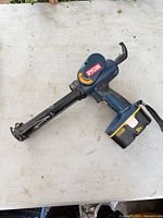 Right side view showing full tool with battery attached