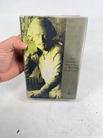 Front view of hardcover book with dust jacket