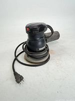 Front and side view of Porter-Cable Quicksand sander with cord coiled