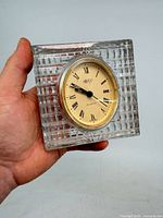 Front view showing Mikasa crystal clock face and cut design