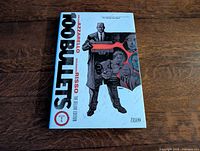 Front cover of 100 Bullets Book 1 Deluxe Edition hardcover