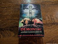 Front of sealed Demoniac Wizard Video big box VHS