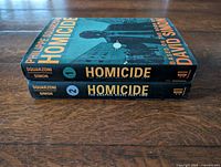 Spines of both volumes showing titles, numbering 1 & 2, publisher mark