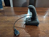 Full view of Night Force joystick on base