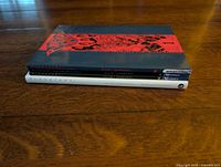 Stacked side view of all four Planetary volumes showing spines