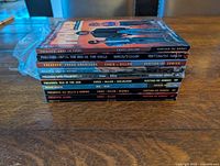 Spine view of all ten Preacher trade paperbacks stacked
