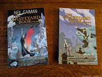 Front covers of both graphic novel volumes