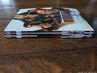 Spine view showing all three Velvet volumes 1-3 stacked