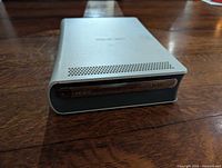 Front view of Xbox 360 HD DVD Player showing disc slot and branding