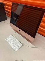 Front angled view of iMac and keyboard