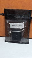 Opal pouch labelled Jet Black Galaxy